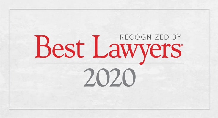A white plaque with the text “Recognized by Best Lawyers® 2020.” The words “Best Lawyers” are in large red letters; the rest of the text is in gray.